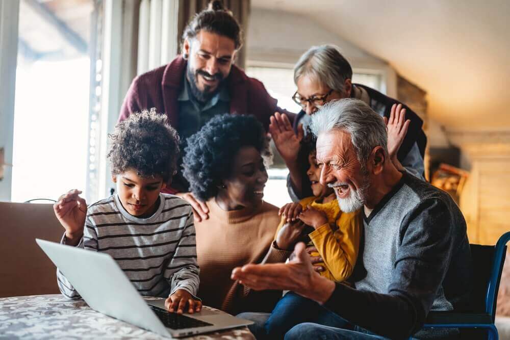 multigenerational family using a computer together